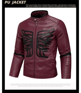 Detail of burgundy PU leather jacket featuring black wing embroidery and stand collar