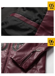 Detail of burgundy PU jacket featuring internal pocket lining and zip cuff with leather patch