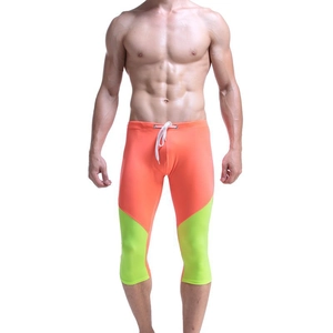 Men's quick-dry three-quarter fitness tights in fluorescent orange and green with drawstring