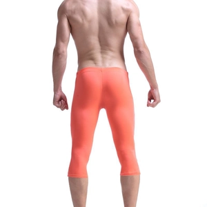 Men's quick-dry compression 3/4 leggings in bright orange for gym and fitness