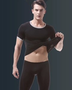 Detail showing the high elasticity of men's black ice silk short sleeve and pants set