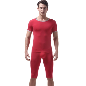 Detail of red men's ice silk thermal t-shirt and shorts set with grey contrast trim