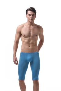 Close-up of sky blue ice silk fabric texture on men's athletic shorts with stitching