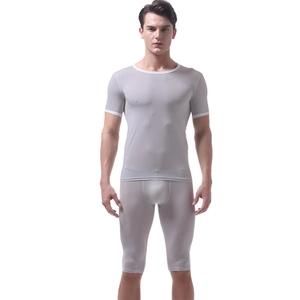 Detail of grey short sleeve compression t-shirt and matching sports shorts set for men