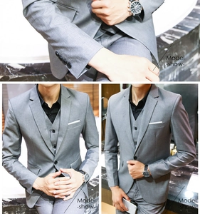 Detail showing grey slim fit three-piece suit with notch lapel blazer and vest