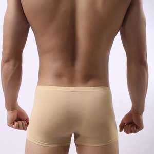 Men's ice silk boxer briefs in beige color featuring a seamless back design for comfort