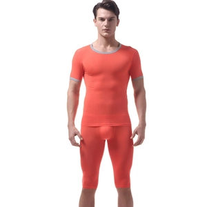 Detail of men's orange ice silk sports set with gray contrast binding and quick-dry fabric