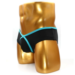 Men's low-rise sexy briefs in black and light blue color block design on a gold mannequin