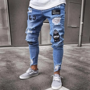 Slim fit light blue distressed jeans for men featuring hip hop patches and ripped details