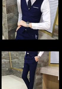 Detail of navy blue slim fit business vest and matching trousers with shirt and tie
