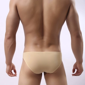 Rear view of men's seamless beige elephant trunk briefs on a male model with athletic build
