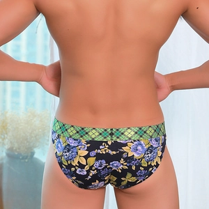 Rear view of men's cotton briefs featuring floral print and green plaid elastic waistband