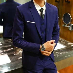 Slim fit navy blue three-piece men suit with jacket, vest and trousers for formal events