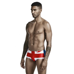 Detail of men's low-waist swim briefs with a vibrant British Union Jack flag print