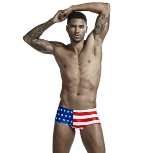 Close-up of men's American flag print swimming trunks with stars and stripes detail