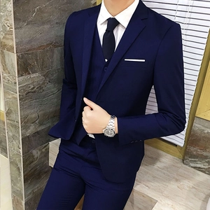 Slim fit men's three-piece navy blue suit including blazer vest and trousers