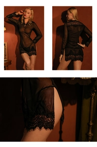 Detail of black mesh nightgown featuring lace trim and traditional frog buttons