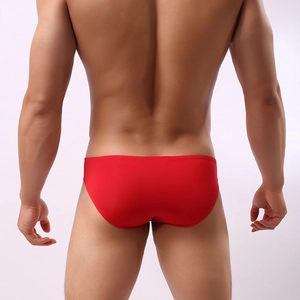 Men's sexy red low-rise briefs in high-elasticity fabric, back view on male model