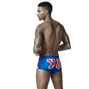 Men's royal blue low-waist trunk swimwear with bold KU print and quick-dry fit
