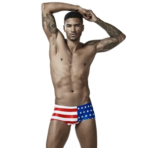 Men's low waist square-cut swim trunks featuring American flag stars and stripes print