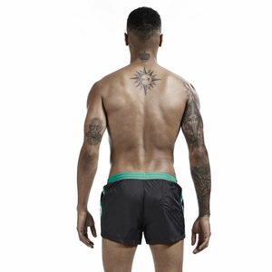 Rear view of men's quick-dry sports shorts with green elastic waistband and back pocket