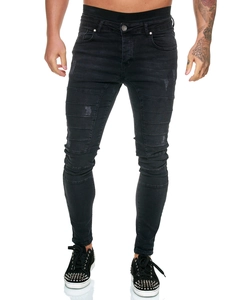 Détail du jean skinny noir anthracite avec plis motard et finition délavée