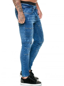 Jean biker slim bleu pour homme avec empiècements plissés et denim délavé usé