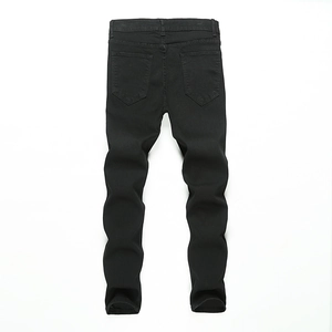 Vue arrière détaillée du jean slim noir pour homme avec poches et texture en denim