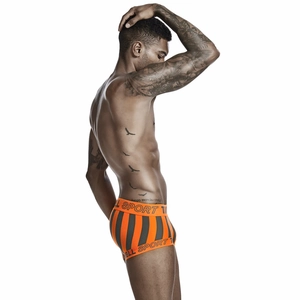 Detail of men's low-rise boxer briefs featuring orange and grey vertical stripes and logo waistband