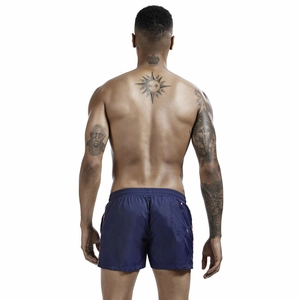 Detailed back view of men's dark blue quick-dry swim trunks with elastic waist and back pocket