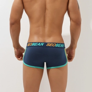 Rear view of men's athletic boxer briefs in navy blue with contrast orange piping