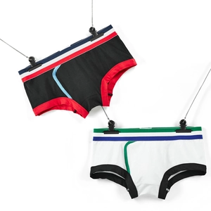 Detailed close-up of low-rise men's boxer briefs with elastic tricolor waistband design