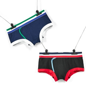 Detail view of men's low-rise boxer briefs with striped waistband and contrast trim accents