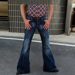Men's dark blue flared jeans with vintage washed denim fabric and bell-bottom silhouette