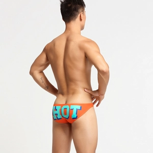 Vista posteriore degli slip da uomo arancioni con stampa grafica HOT blu e verde