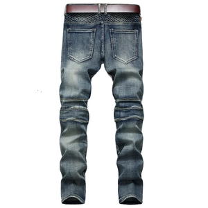 Vue détaillée du dos d'un jean vintage bleu pour homme avec plis motard et ceinture cuir