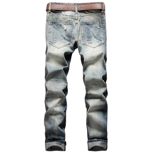 Men's light blue distressed straight leg jeans with vintage ripped details and leather belt