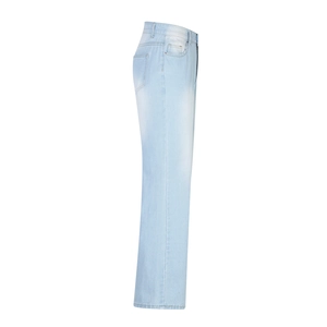Side view showing high waist cut and soft washed texture of light blue denim pants