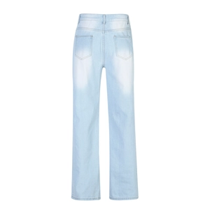 Detail view of high waist wide leg jeans featuring faded wash texture and back pockets