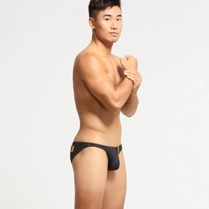 Slip da uomo a vita bassa con stampe geometriche laterali e taglio sportivo sgambato