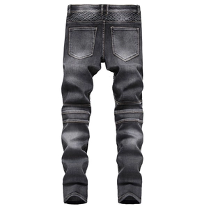 Détail du jean biker gris pour homme avec coutures côtelées et plis aux genoux