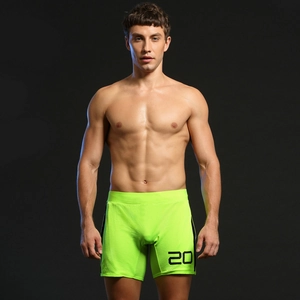 Détail du short de sport en maille vert fluo pour homme avec taille élastique
