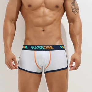 Men's low-waisted boxer briefs in white with contrast blue waistband and U-convex pouch