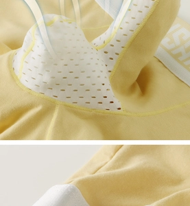Detail view of men's breathable boxer shorts featuring white honeycomb mesh pouch