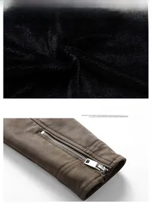 Close-up of brown PU leather sleeve with silver zipper and thick black lining