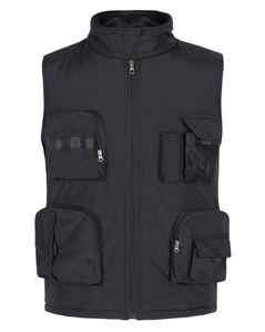 Detailed view of black tactical vest featuring multiple utility pockets and zip closure