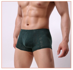 Détail de boxer mince pour homme vert avec imprimés de lèvres et taille élastique