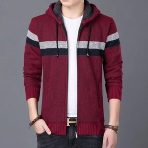 Detail of wine red knit hoodie showing striped chest pattern and fleece lining