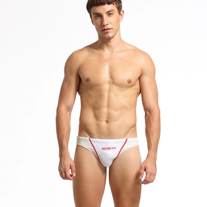 Slip de sport pour homme blanc taille basse avec bordure rouge et coupe ajustée