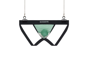Detail view of men's jockstrap featuring breathable green honeycomb mesh fabric pouch